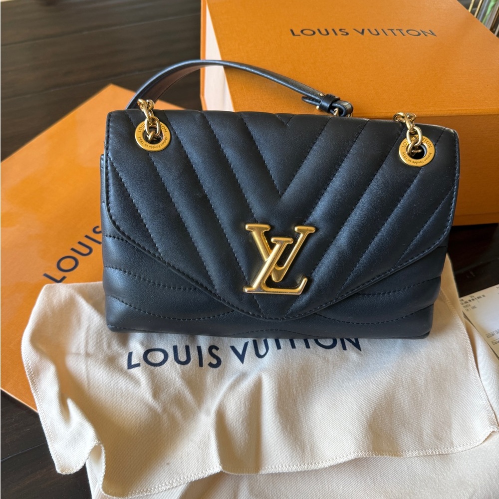 Louis Vuitton Black Quilted Shoulder Bag with Gold Hardware
